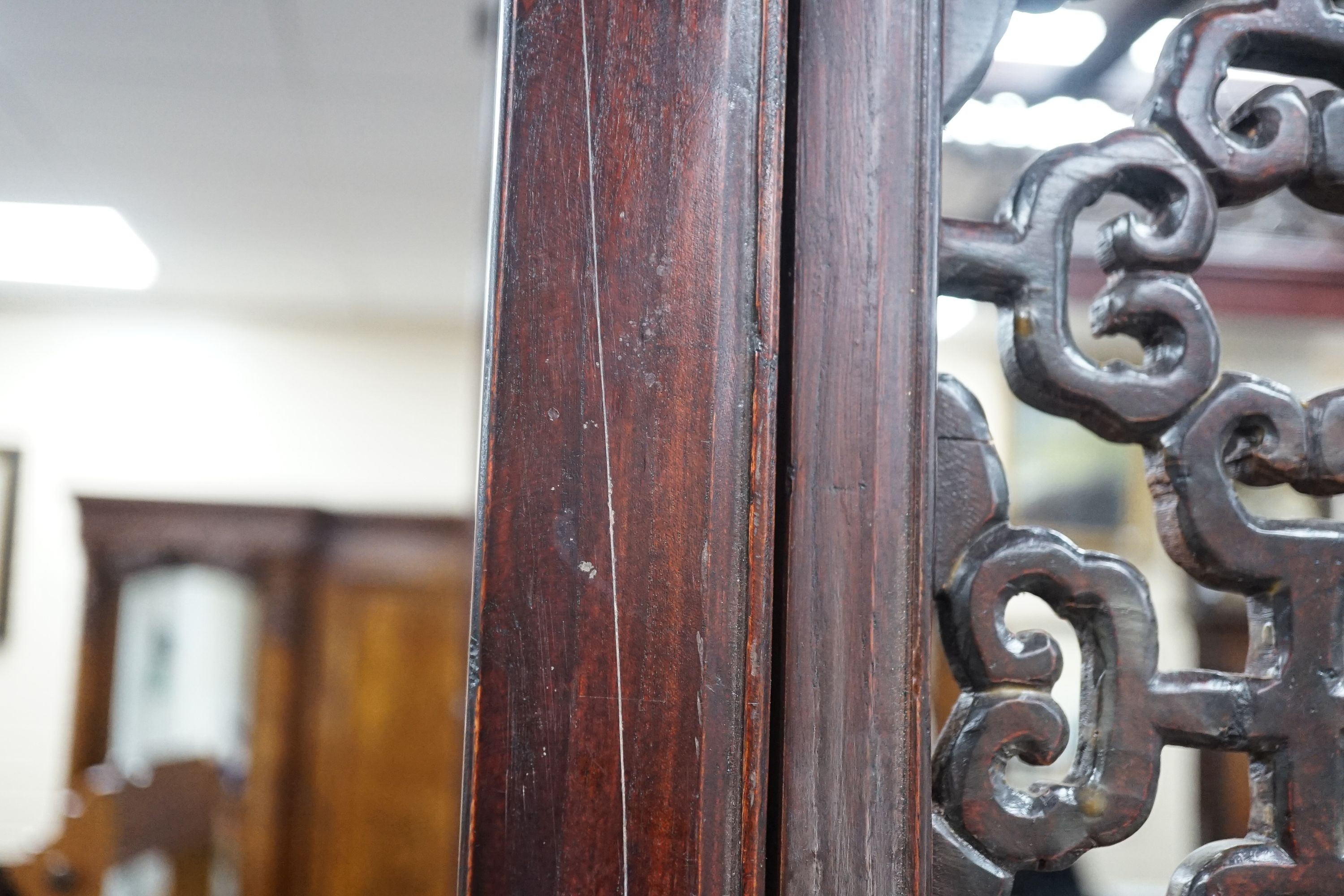 A Chinese carved elm opium bed, width 160cm, depth 207cm, height 225cm